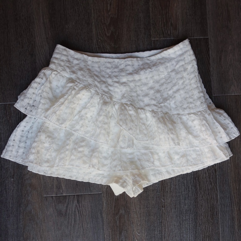 Adorable white skirt with square details!